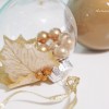 gold holly glass ornament