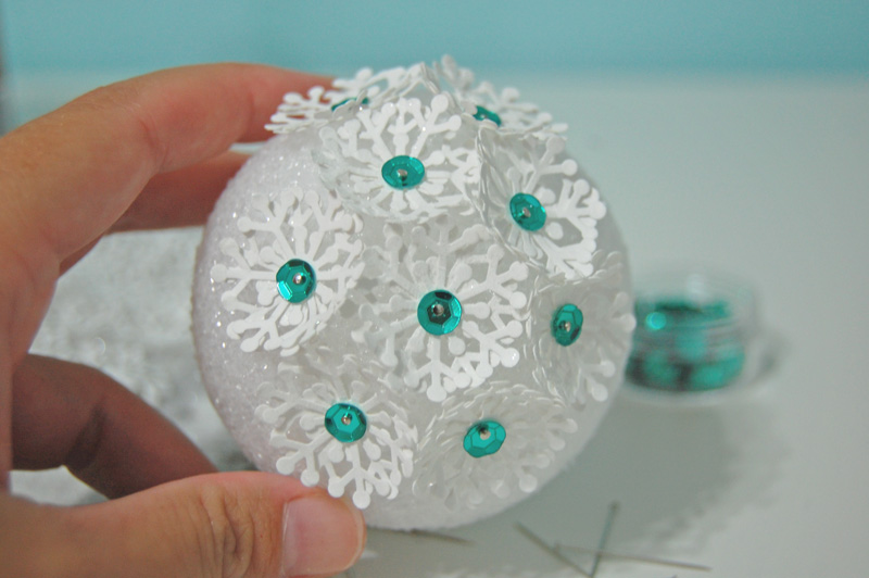 pin snowflakes into styrofoam ball