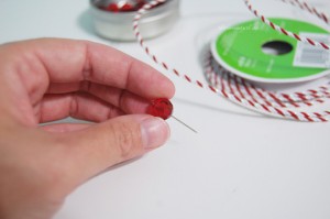Thread bead onto straight pin