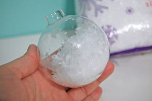fill glass ornament with fake snow