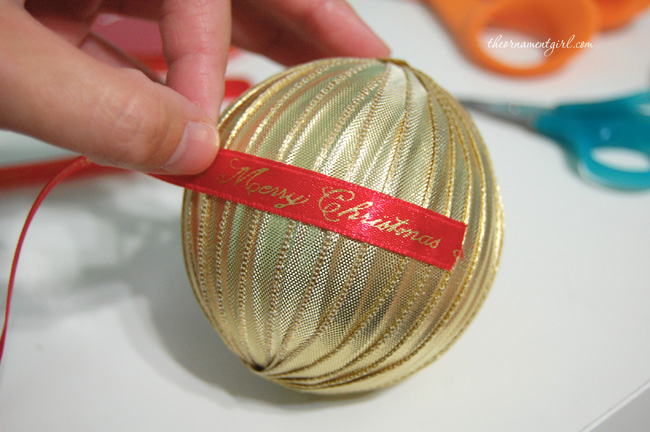glue ribbon around center of ornament