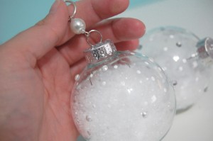 snow filled clear glass christmas ornament