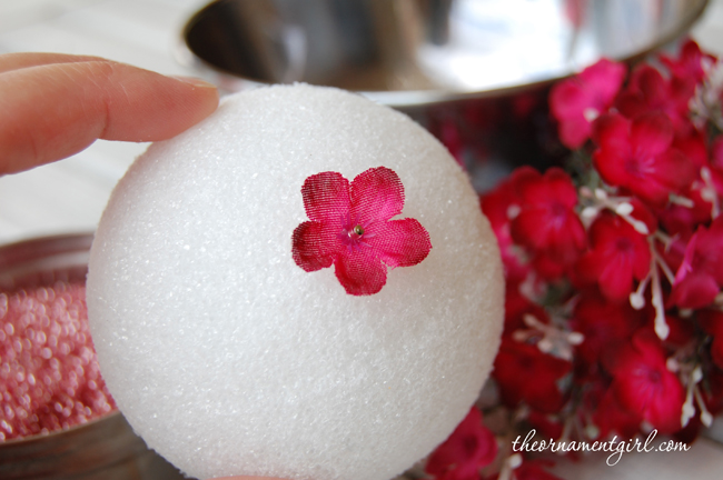 pin flower to styrofoam ball