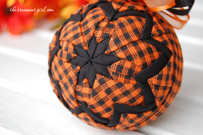 halloween quilted ornament kit with orange and black plaid fabric