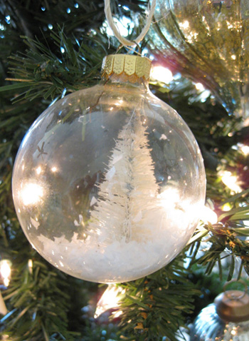 bottle brush tree in clear glass ornament