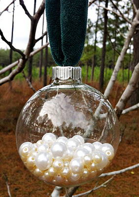 clear glass ornament filled with pearls