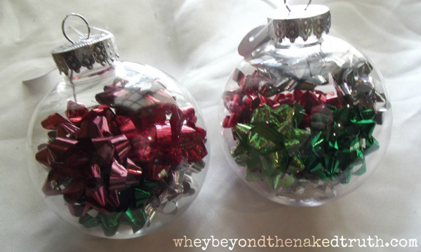 gift bows in clear glass ornaments