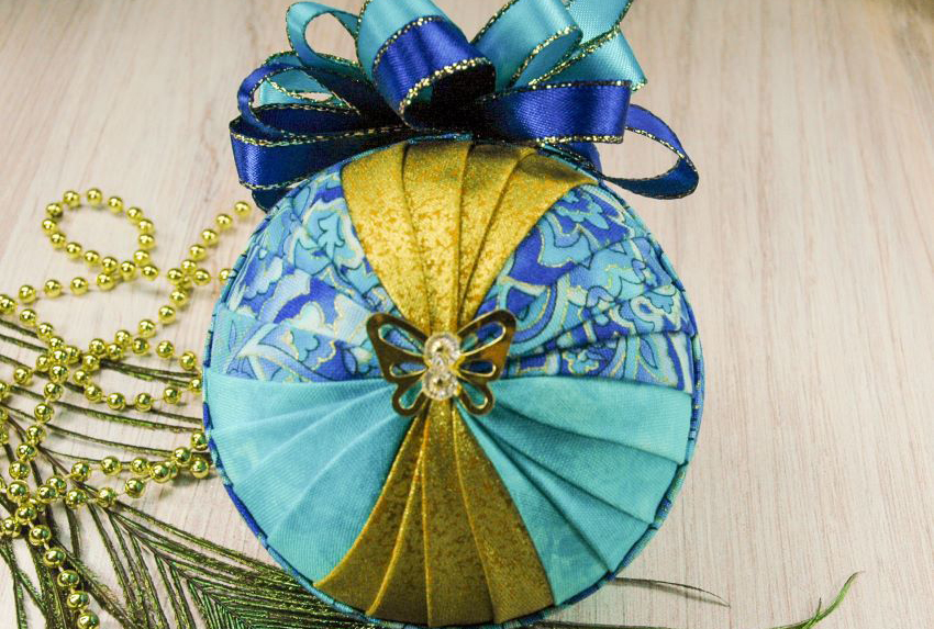 butterfly-parasol-quilted-ornament-pattern-teal-gold